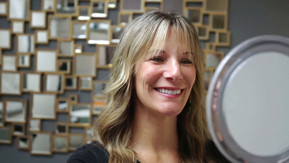 woman happy with smile makeover results