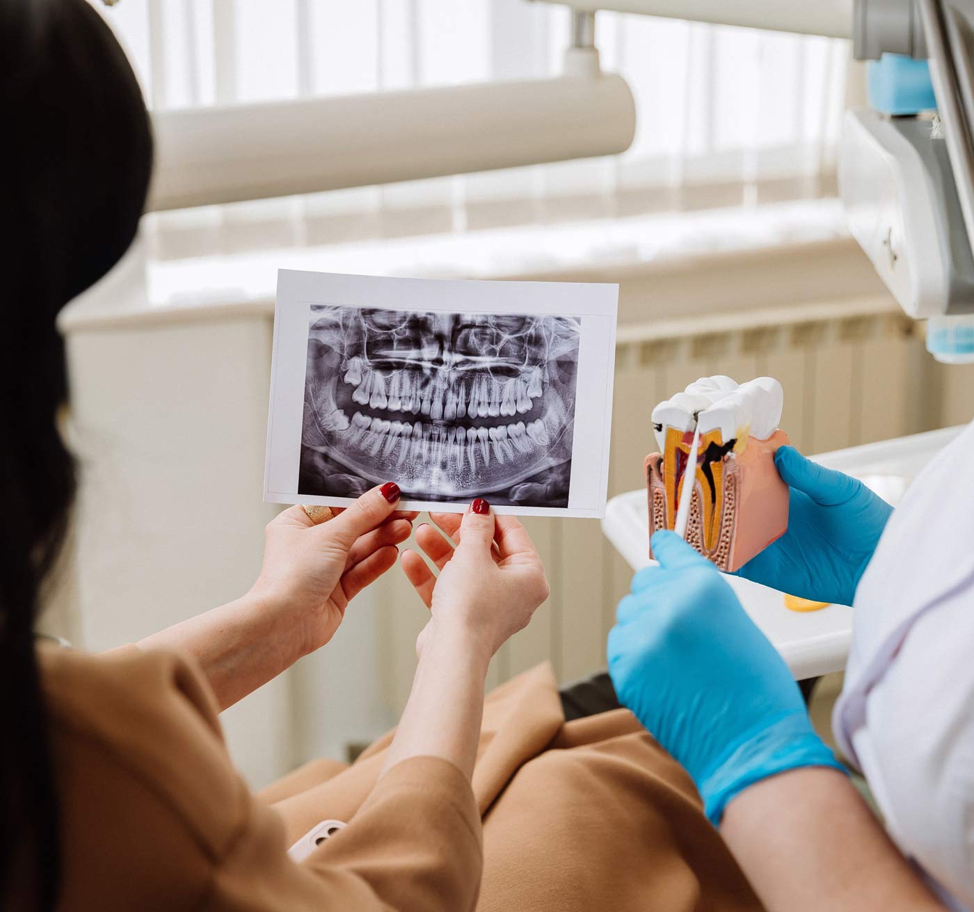 Woman looking at dental x-ray