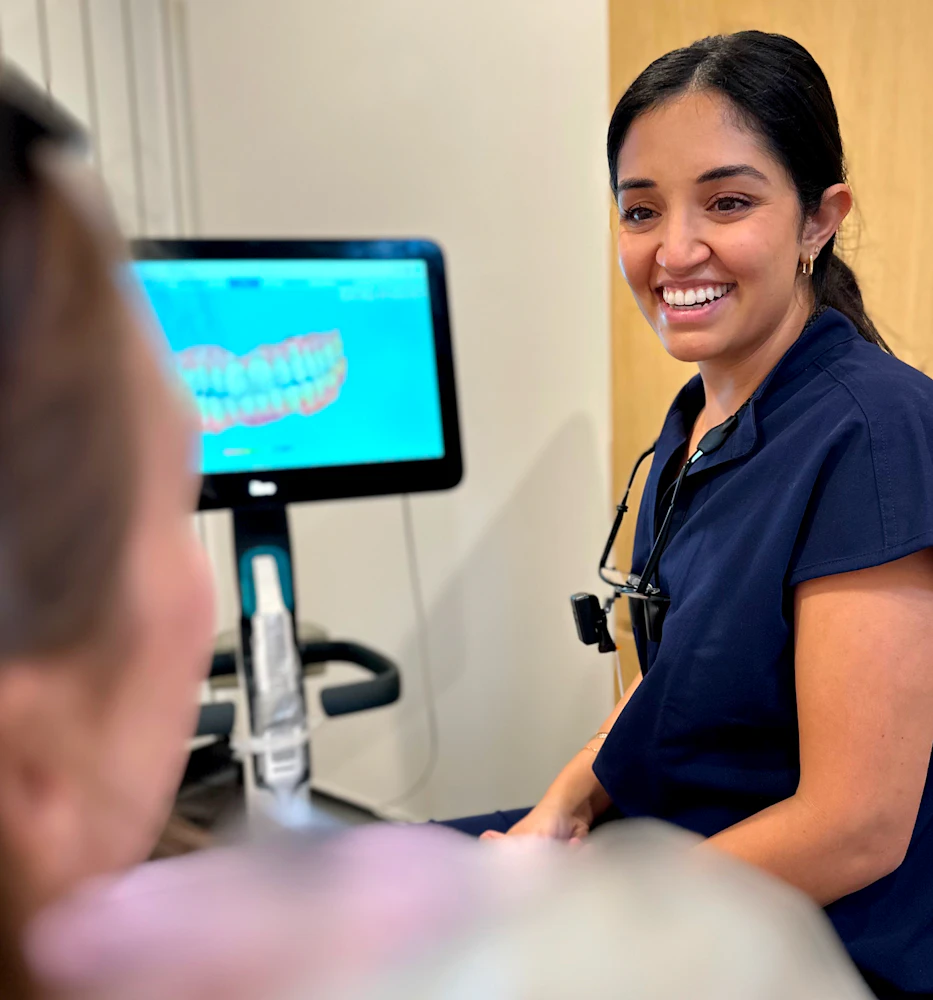 Smiling staff in a patient consult