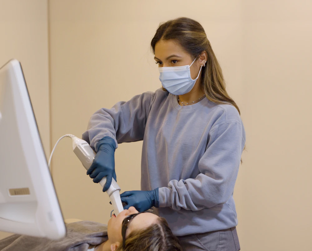 Breeze Oral Care team member conducting exam