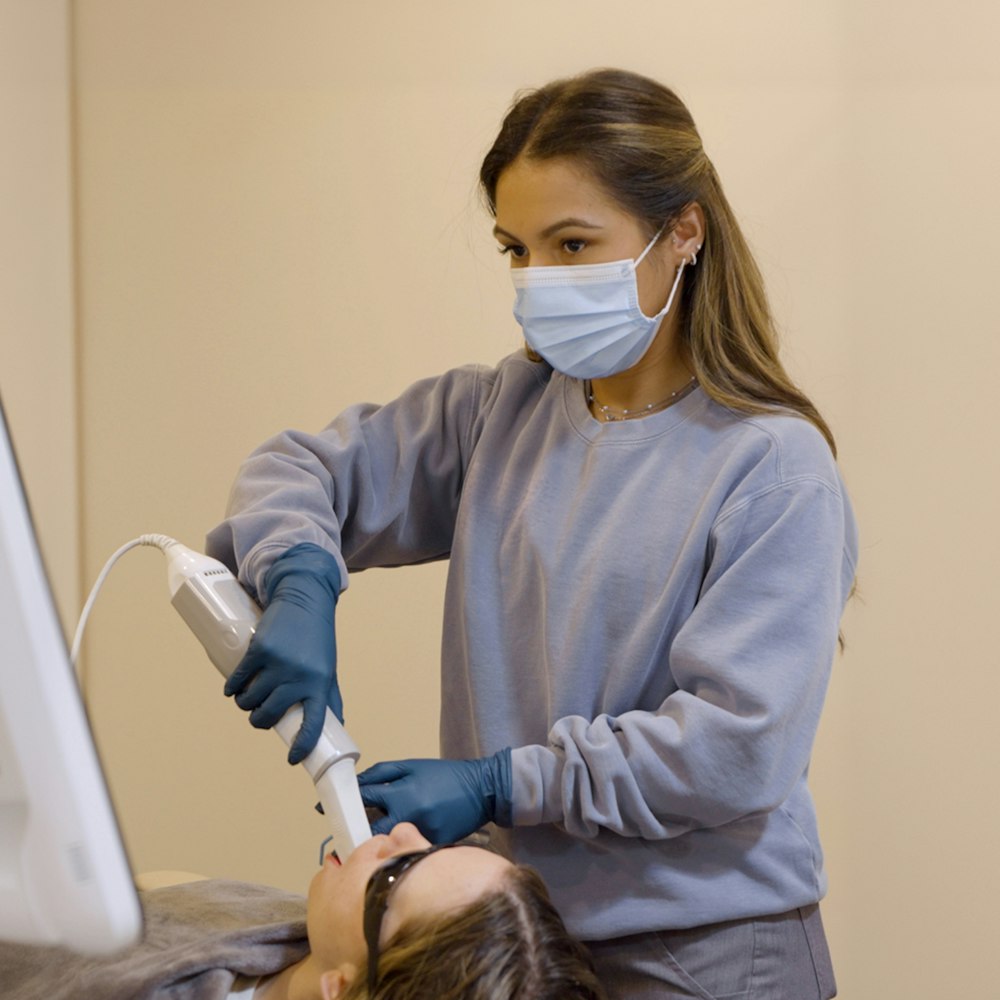 Breeze Oral Care team member conducting exam