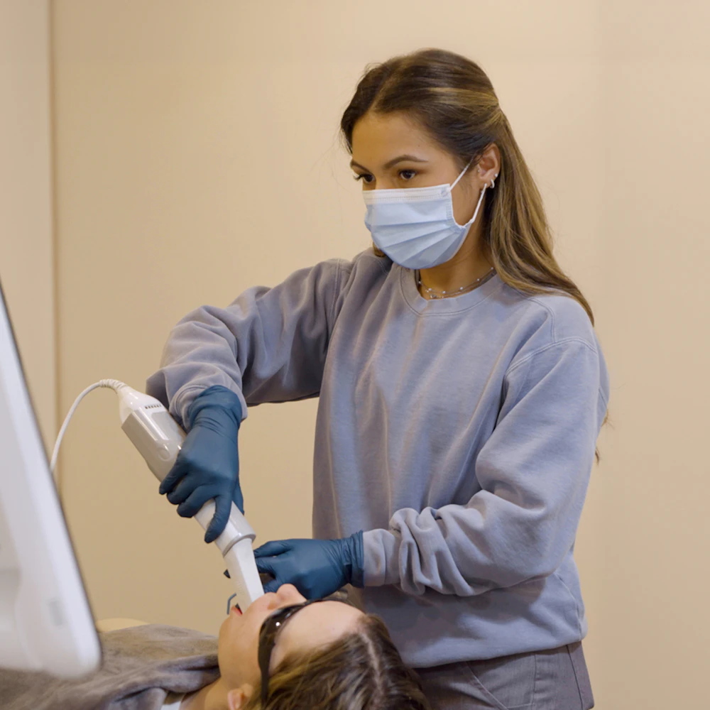 Breeze Oral Care team member conducting exam