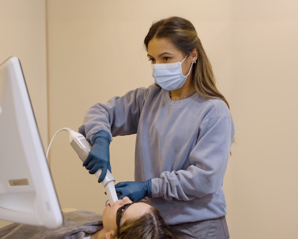 Breeze Oral Care team member conducting exam
