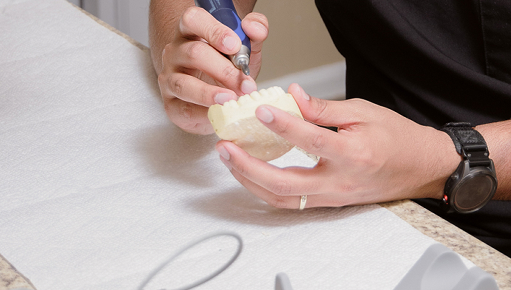 Hand-finishing a dental model