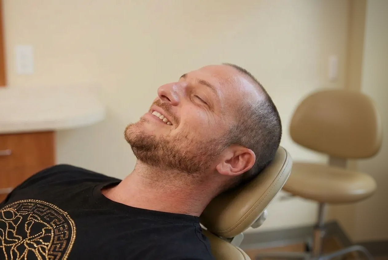 man relaxing in the dental chair