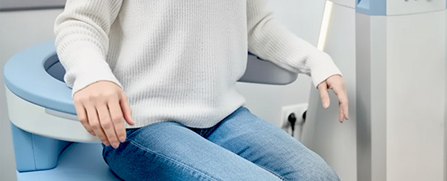 Woman during Emsella treatment