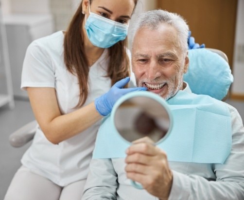 Man smiling in mirror