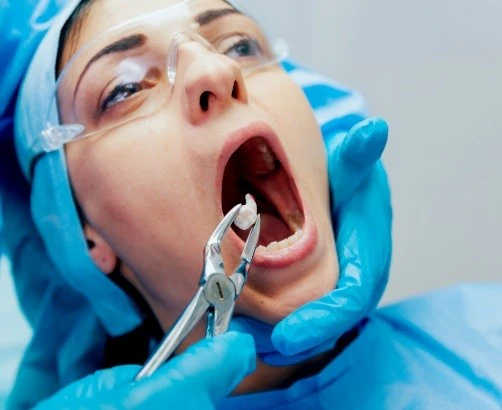 Image of a patient undergoing a Tooth Extraction