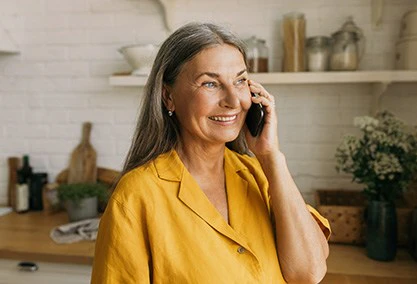 Woman smiling on the phone