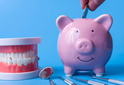 piggy bank with dental tools