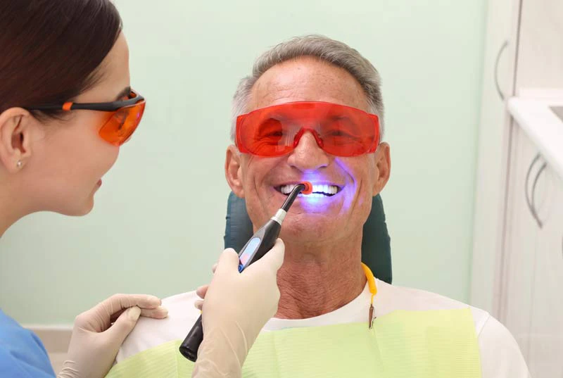 Man having teeth whitened