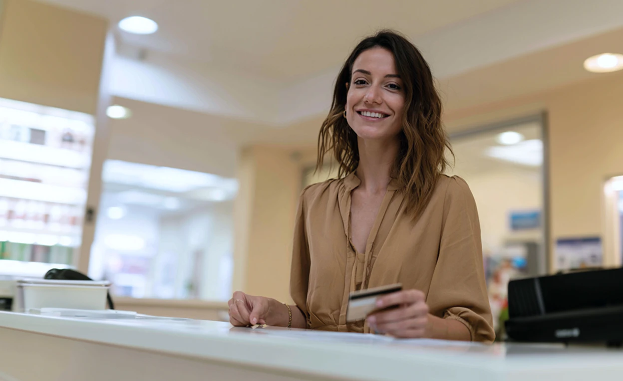 woman holding credit card