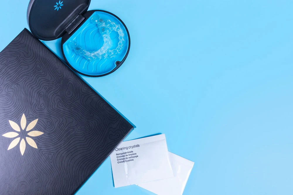 Invisalign kit with trays, holder, cleaning crystals