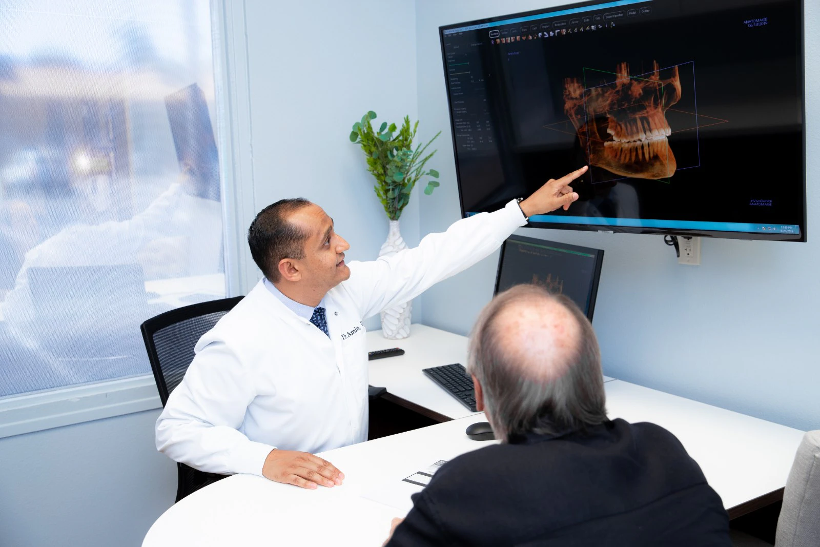 Doctor looking at patient