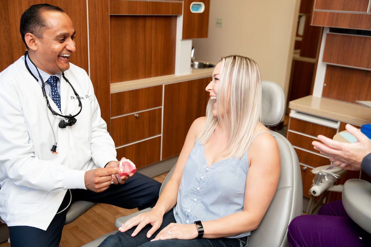 Dr. Amin speaking with patient