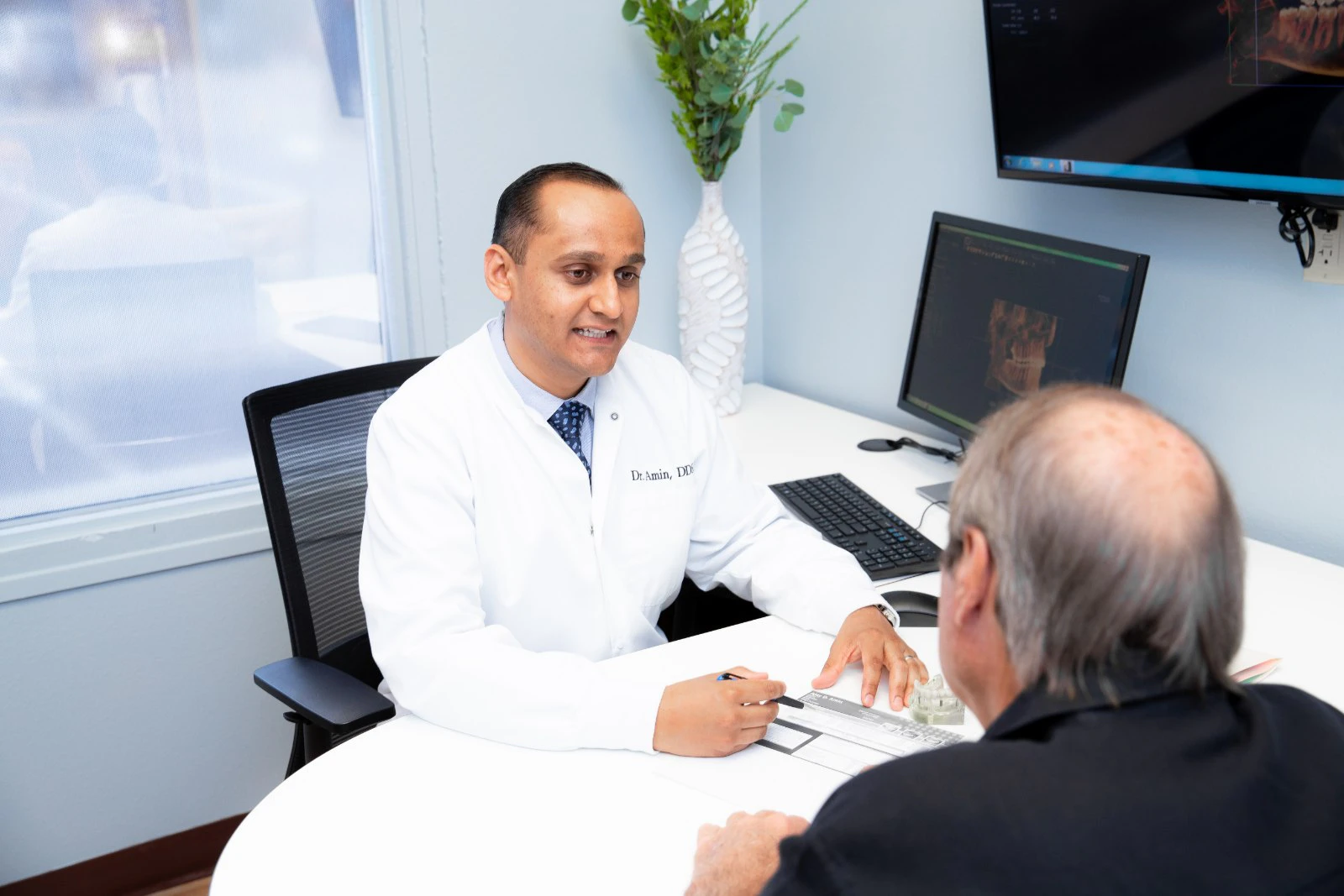 Doctor going over patient