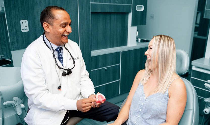 Dr. Amin consulting a patient