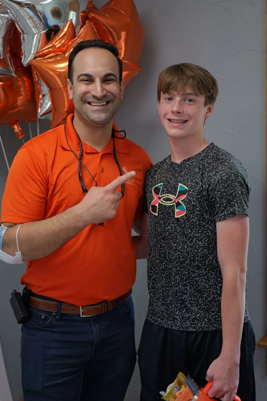 Dr. Tauber with a teen patient