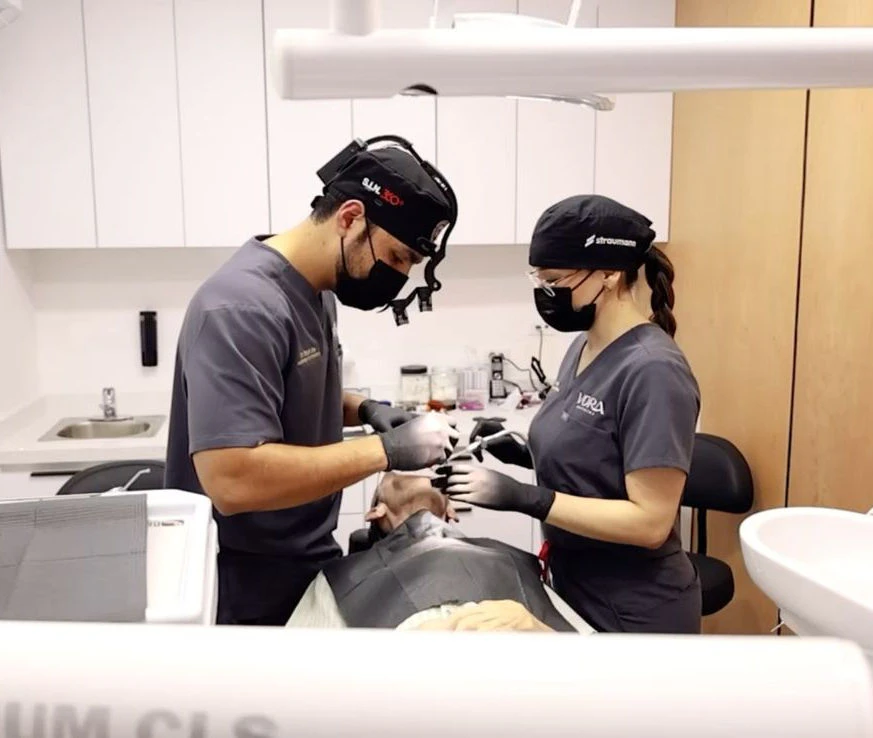 Vora Dentistry dental team with a patient