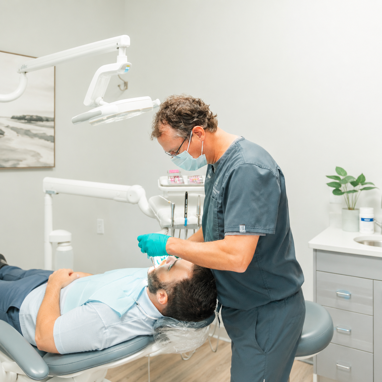 Dentist working on patient