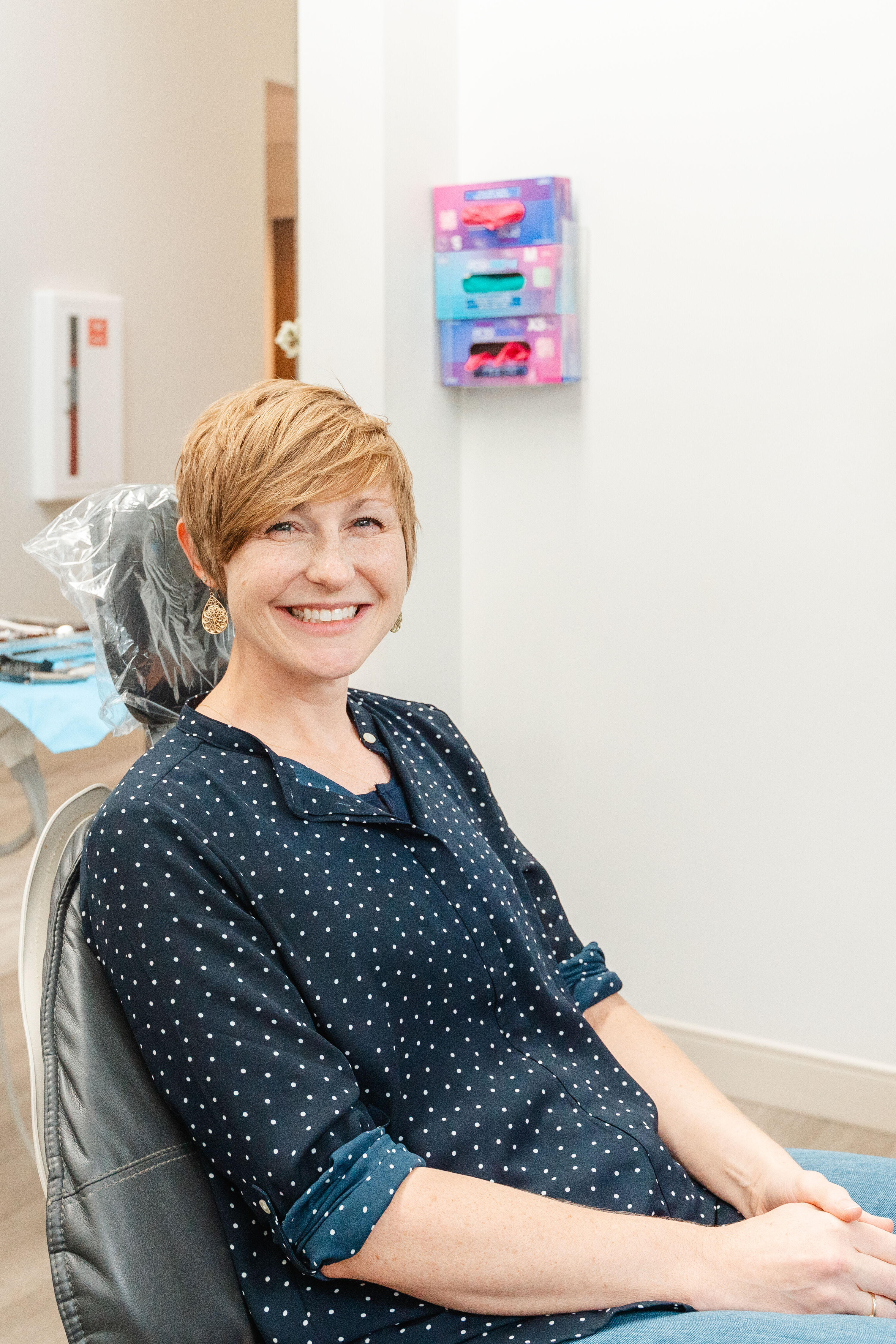patient smiling in dentist chair