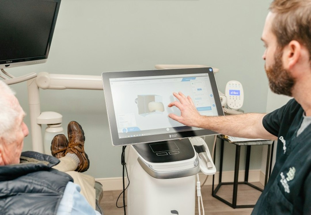 Dentist looking at x-rays