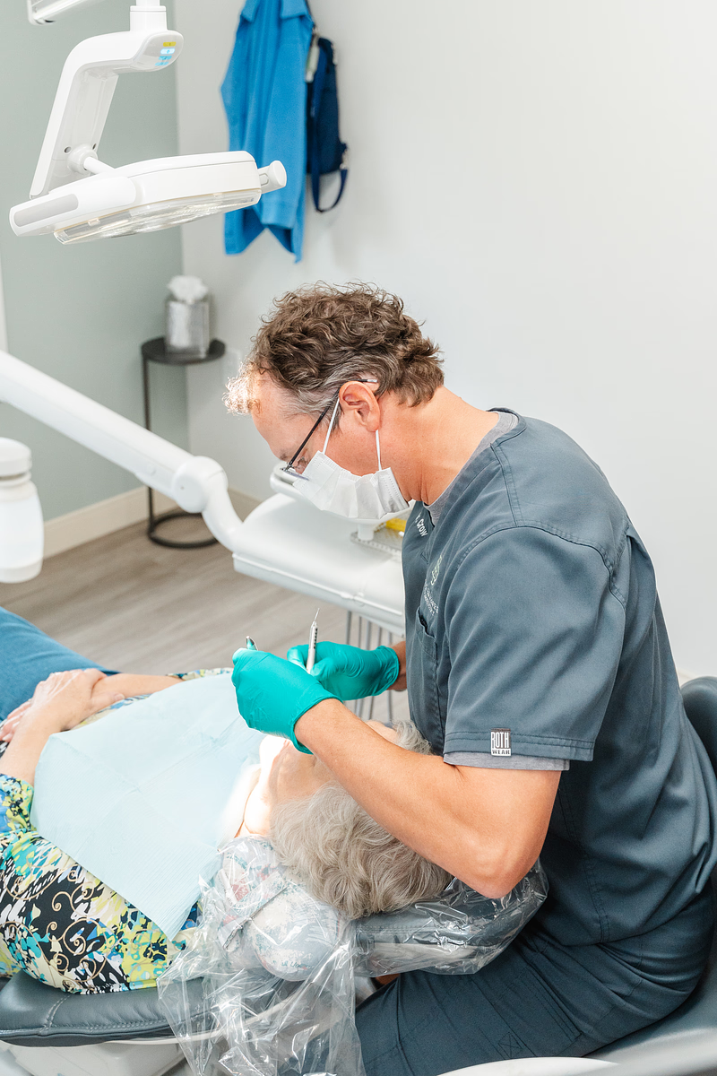dentist working on patient's teeth